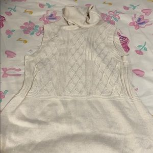 Cream knit turtleneck sleeveless sweater